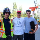 Sound Beach Volunteer Fire Dept member Wheatleigh Dunham with Alex Mozian and Dylan Madden from Greenwich High School. Aug 30, 2017 Photo Leslie Yager