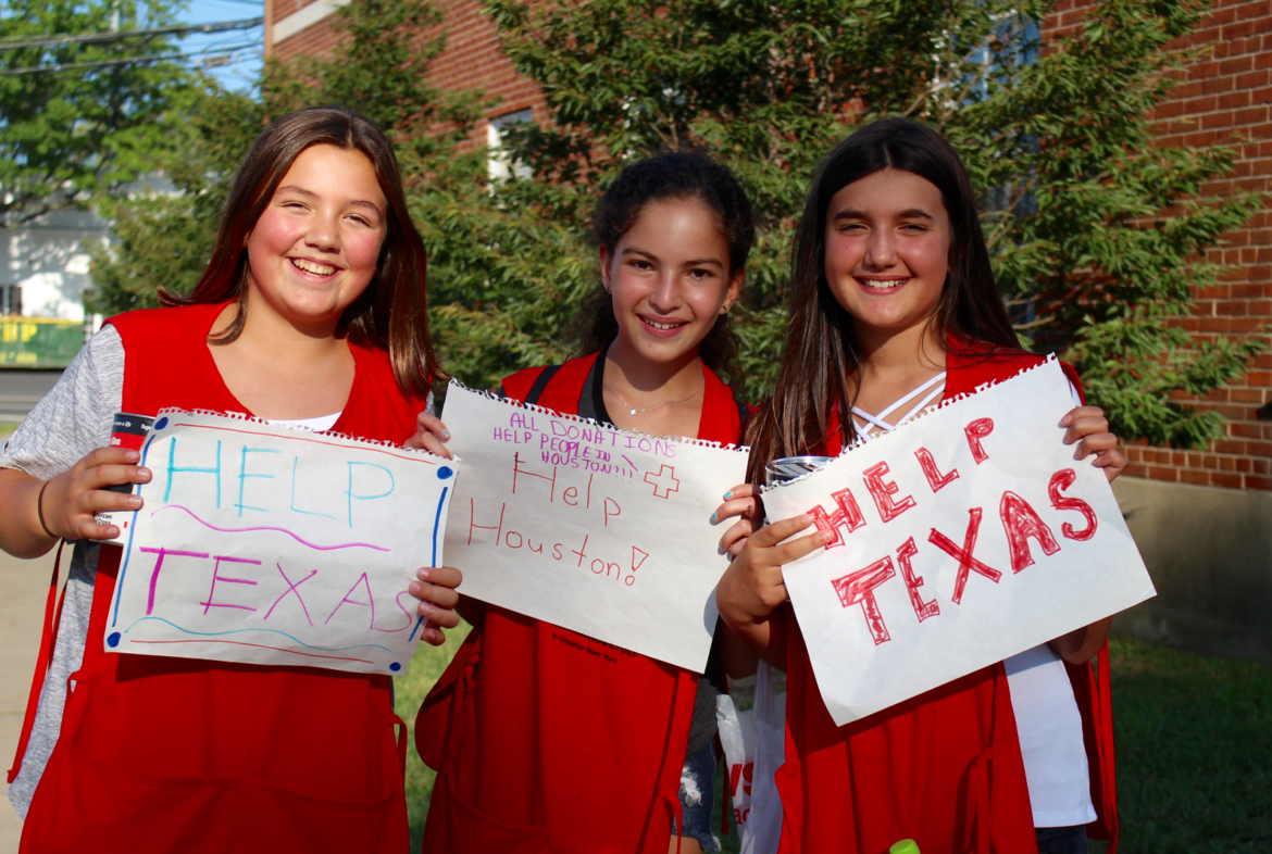 In Old Greenwich, middle schoolers Camille Brommers, Sydney Floch and Kate Marchetti collected donations to assist relief efforts in Houston, Texas, Aug 30, 2017 Photo: Leslie Yager