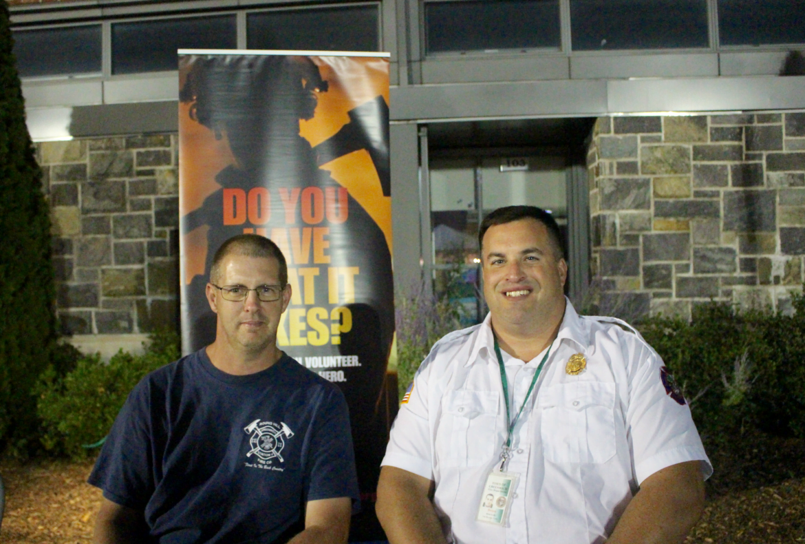 Robert Wilson and Brian Kelly chatted with potential volunteers for the Greenwich Fire Dept Aug 12, 2107 Photo: Leslie Yager