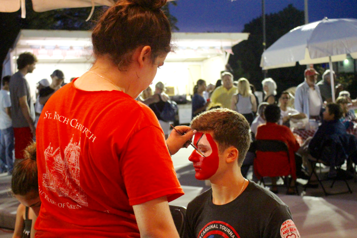Volunteers painted faces at St. Roch Festival, Aug 12, 2017 Photo: Leslie Yager