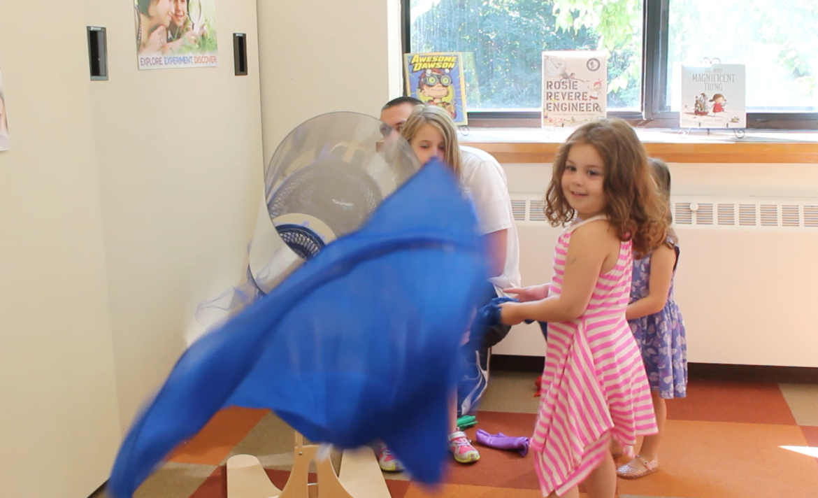 Blasting scarves out of the wind tunnel in the new STEAM classroom at the Selma Maisel Nursery School at Temple Sholom. Aug 24, 2017 Photo: Leslie Yager