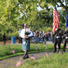 Lt James Bonney played the bagpipes as he led multiple honor guards to the September 11 memorial in Cos Cob Park. Sept 11, 2017 Photo:Leslie Yager