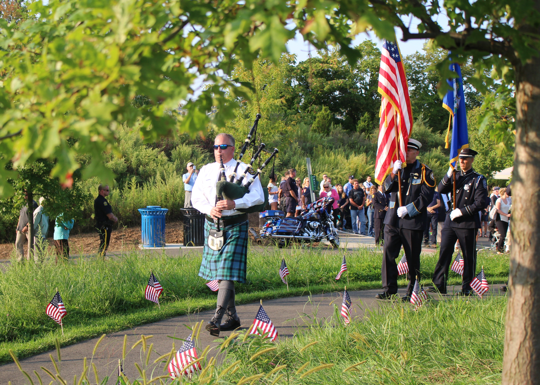 Lt James Bonney played the bagpipes as he led multiple honor guards to the September 11 memorial in Cos Cob Park. Sept 11, 2017 Photo:Leslie Yager