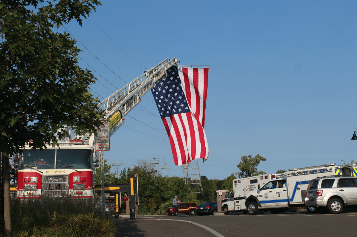 The Greenwich Fire Department presented the American Flag at the entrance to Cos Cob Park on Sept 11, 2017 Photo: Leslie Yager