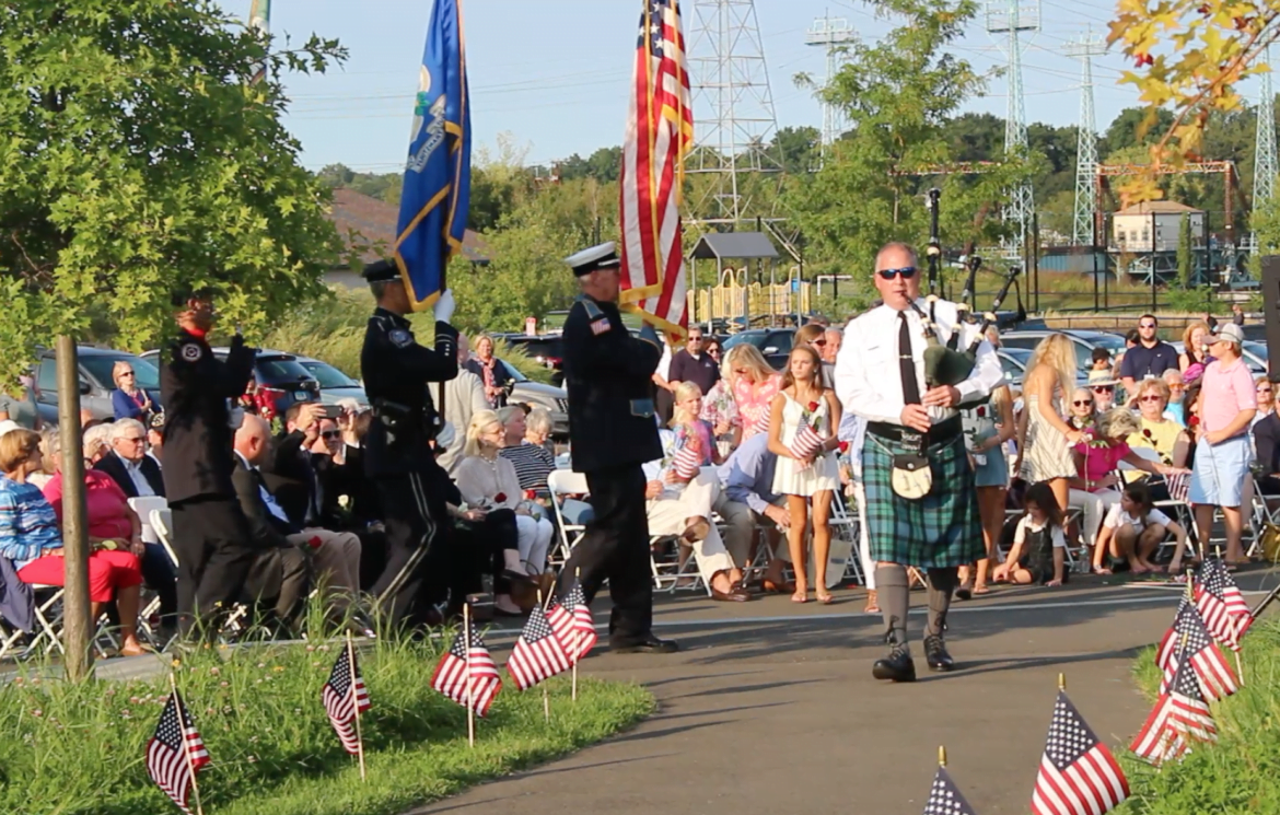 Lt James Bonney played the bagpipes and led everyone from up the hill to the memorial. Sept 11, 2017 Photo: Leslie Yager
