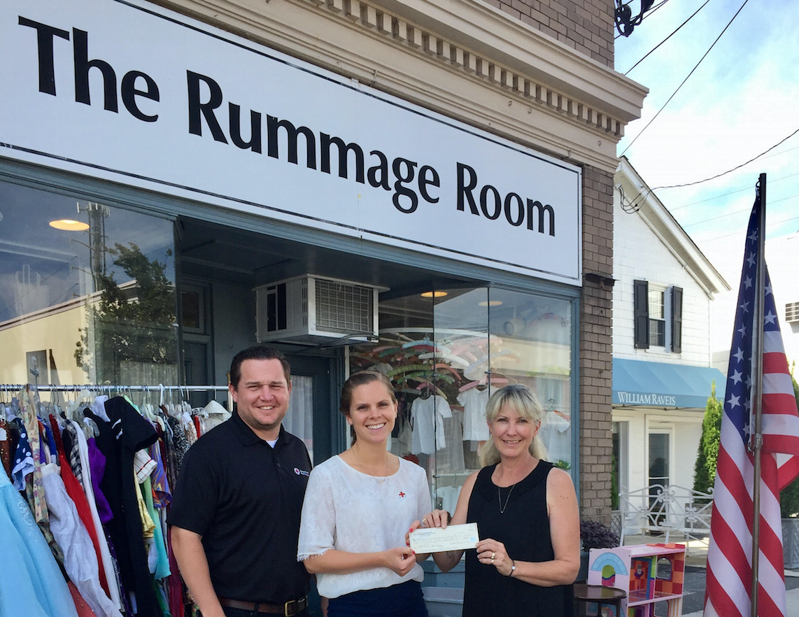 Leanne Meyer, (right) manager of the Rummage Room in Old Greenwich, CT proudly presents a check of $4,824 to the American Red Cross Harvey Relief Fund from the Grand Reopening Day sales on September 5th to Amanda Paktinat and Brandon Ponder, development team of the Metro New York North American Red Cross. 