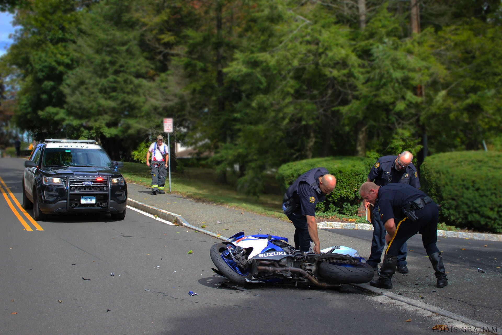 Investigation of scene where motorcycle collided with car on October 10, 2017. PHOTO courtesy of Eddie Graham