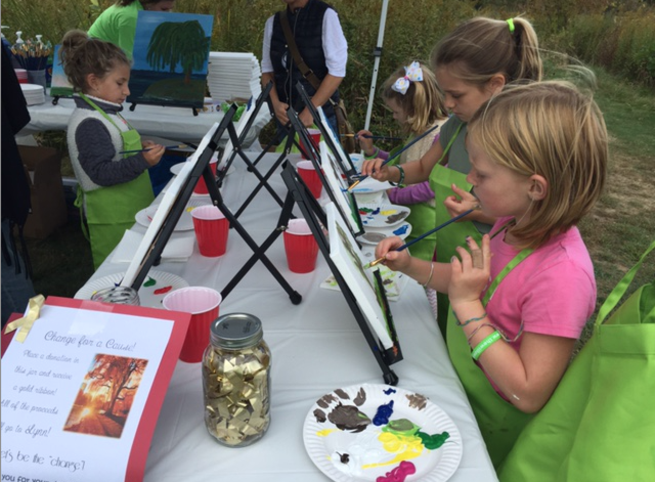Children easel paint with Future Picassos at the Indian Summer Children’s Festival at Greenwich Audubon.