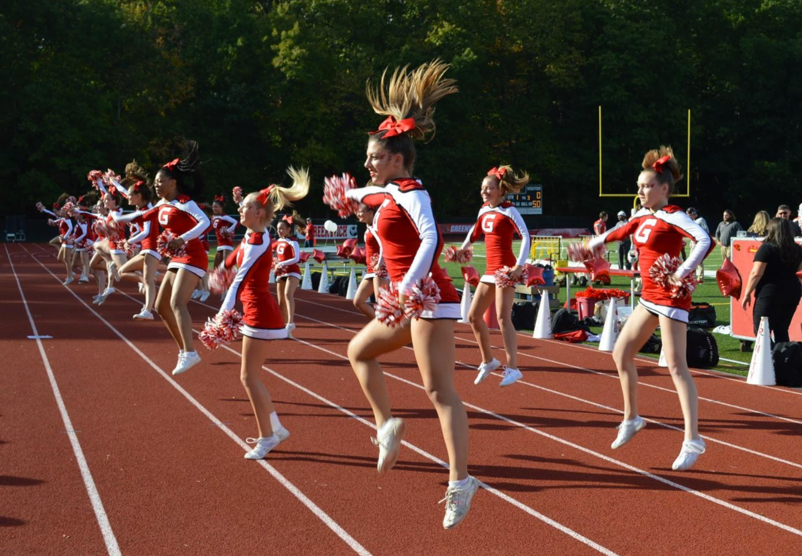 Greenwich High School cheerleaders root for the Cardinals at the homecoming game against Westhill, Saturday Oct 21, 2017 Photo Monique Nikolov