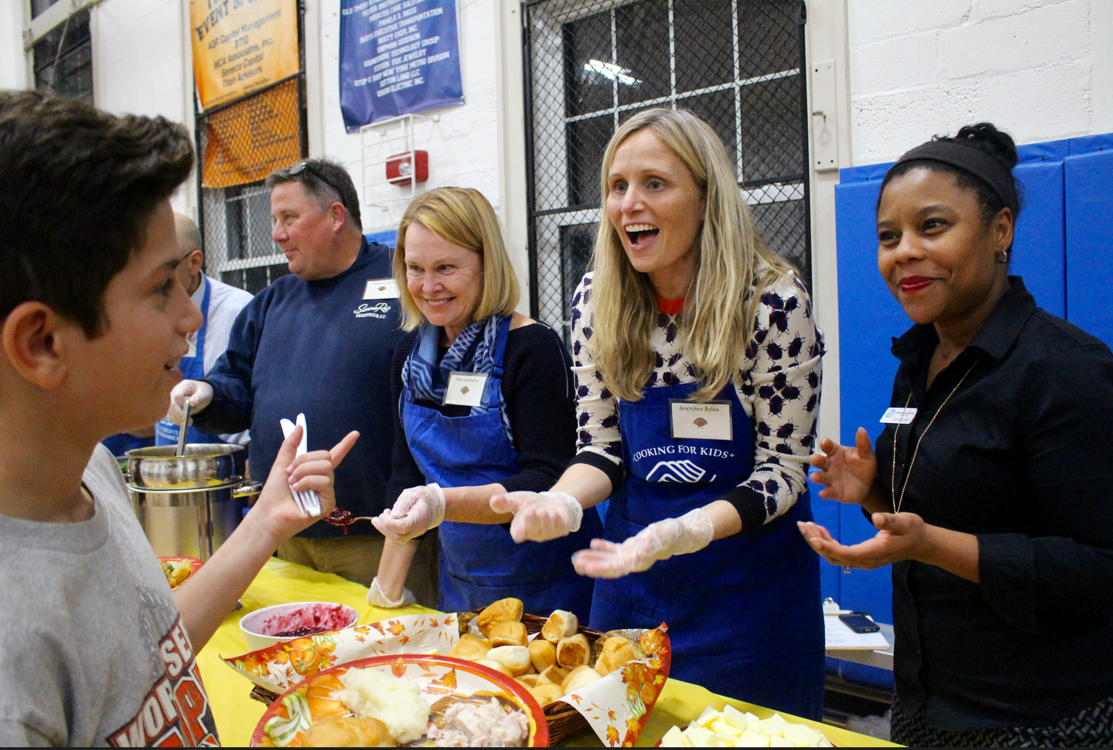 Dozens of volunteers manned the stations at the Boys & Girls Club Thanksgiving feast, Nov. 21, 2017 Photo: Leslie Yager