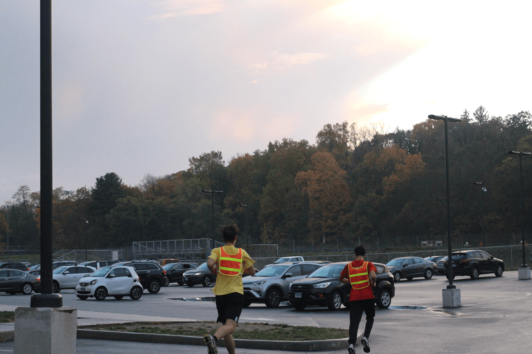 At GHS, runners wore reflective vests as the sunk began to sink. Nov 6, 2017 Photo: Leslie Yager