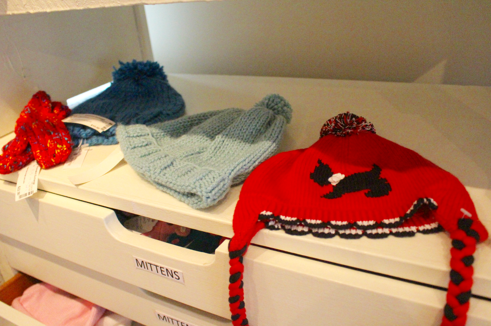 Hand knit hats in time for the holidays from The Greenwich Exchange for Women's Work. Photo: Leslie Yager