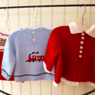 Hand knit sweaters in tie for the holidays at the Greenwich Exchange for Women's Work