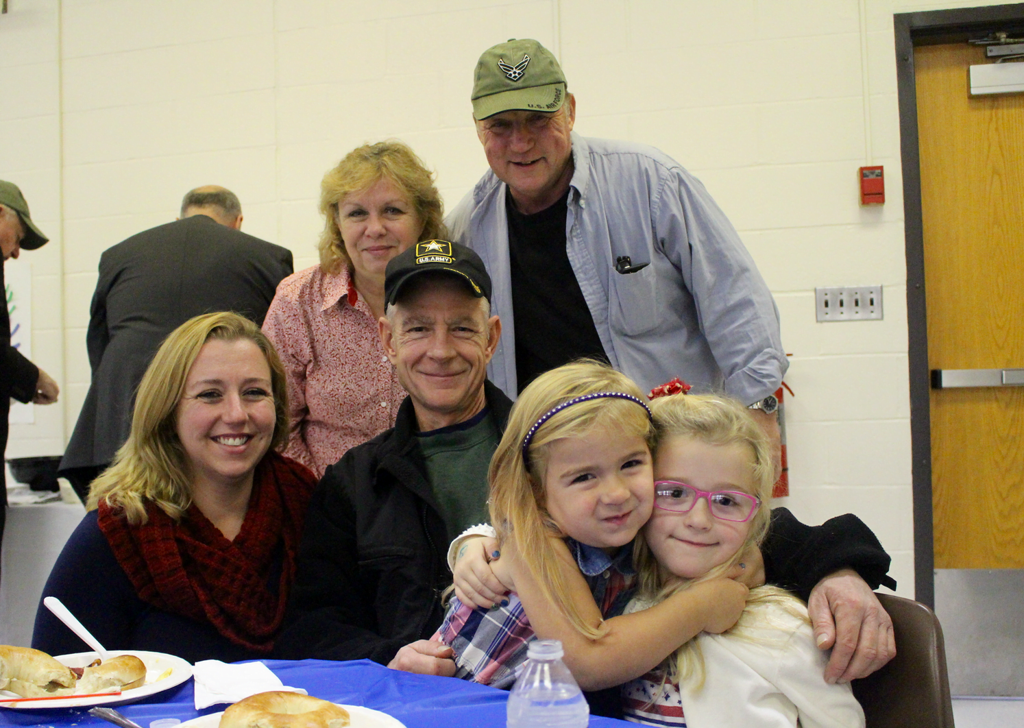 Ali and Joe Conelius and their daughters who attend Parkway School Eliza (grade 1) and Isabelle (PreK-3) and Ali's Parents Georgianne and Dan Ingraham. Nov 9, 2017 Photo: Leslie Yager