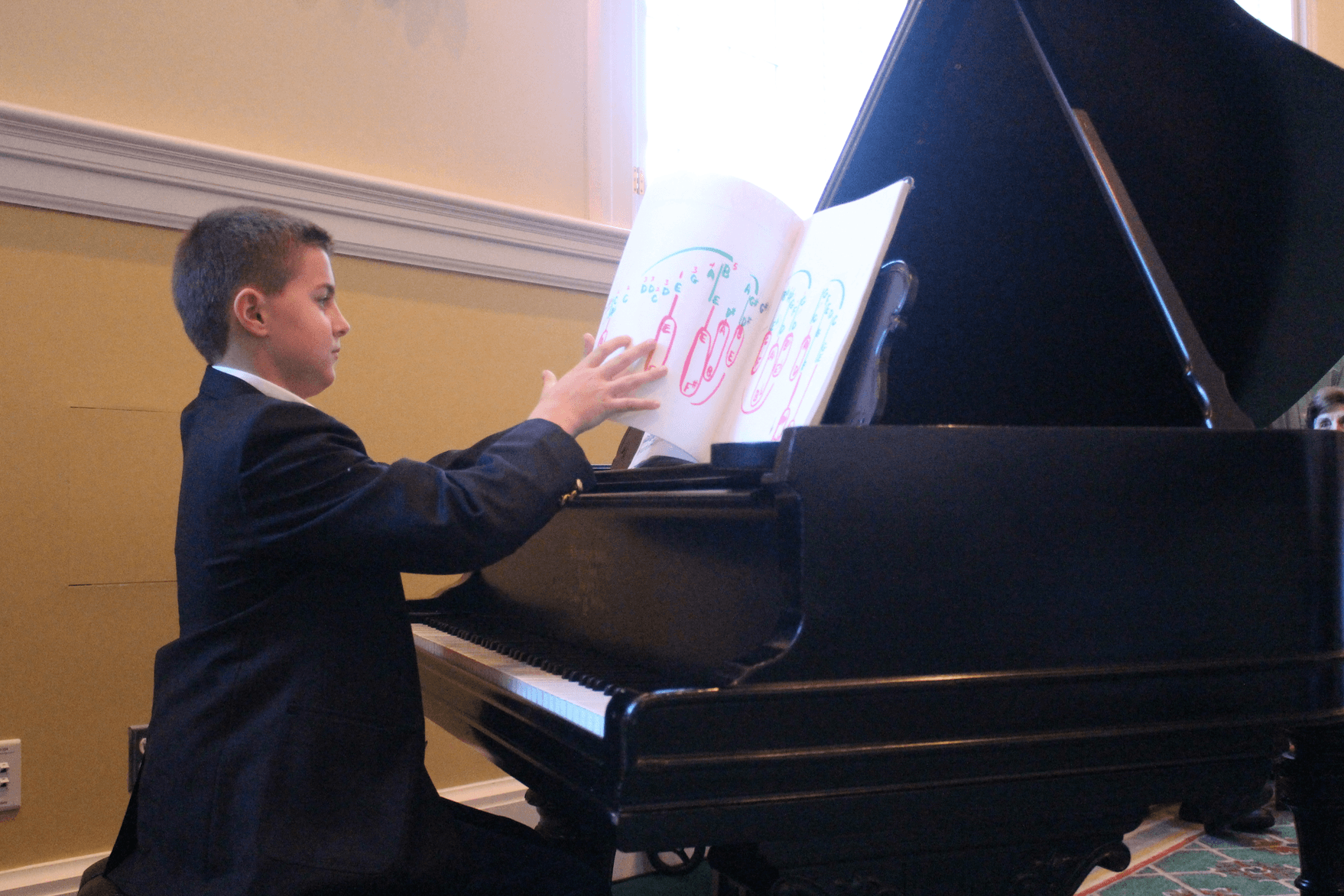 Lucas Lippey played piano for a crowd of over 100 seniors at the First Presbyterian Church of Greenwich on Thanksgiving. Nov. 23, 2017 Photo: Leslie Yager