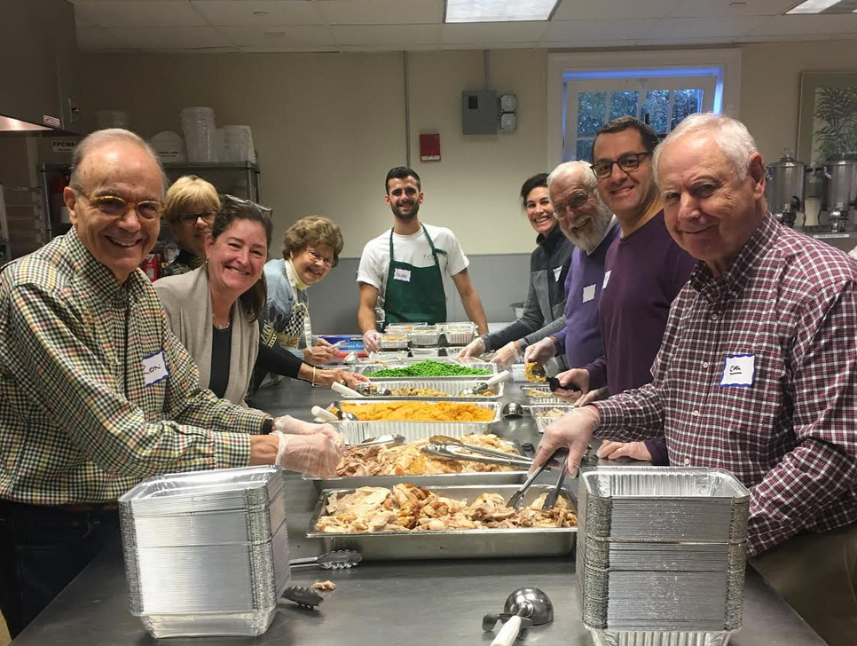 Many of the dozens of volunteers at First Presbyterian Church Thanksgiving 