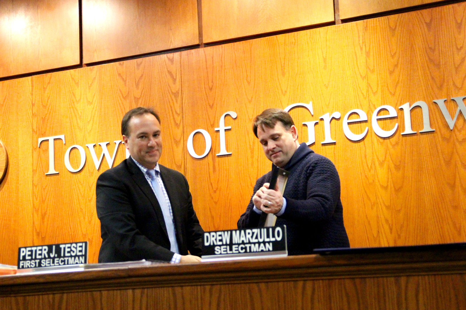 Peter Tesei presented Drew Marzullo with a gift at the last meeting of his term, Nov 30, 2017 Photo: Leslie Yager