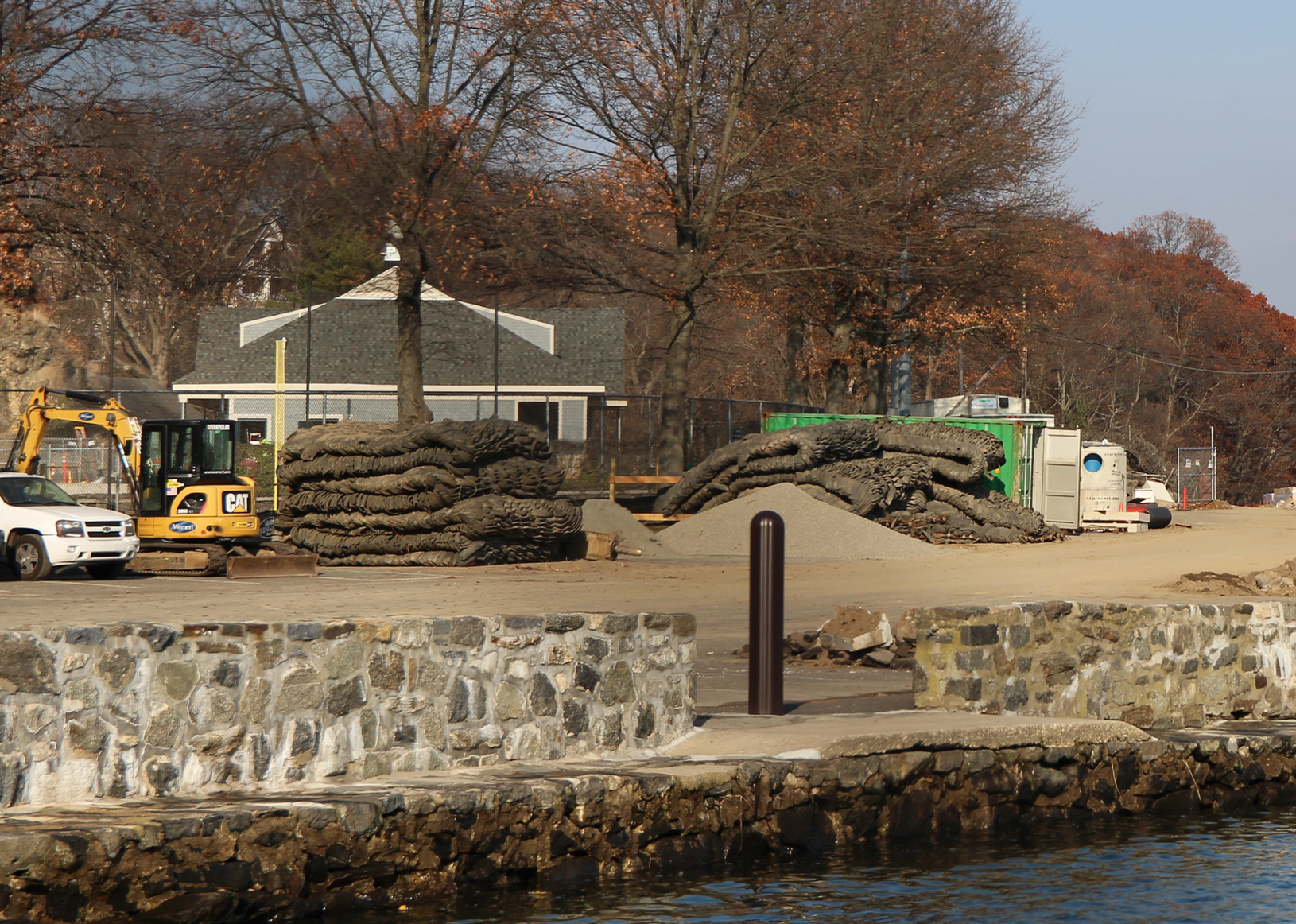View from marina of the new building (left) for the Byram Pool, and parking lot adjacent to pool and beach, which is currently closed. Dec 4, 2017 Photo: Leslie Yager