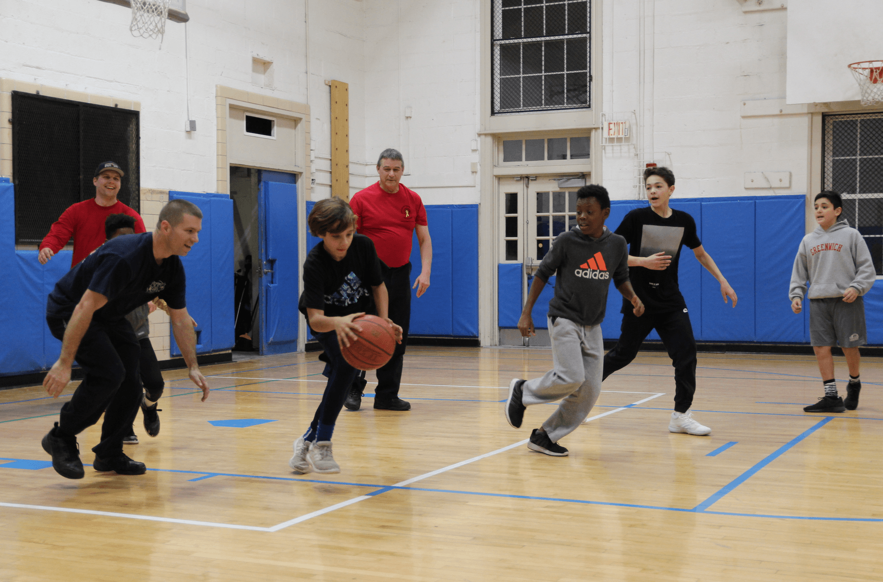 At the Boys & Girls Club of Greenwich, about 80 middle schoolers had a fun Friday night that included members of the Greenwich Fire Dept. Dec 8, 2017. Photo: Leslie Yager