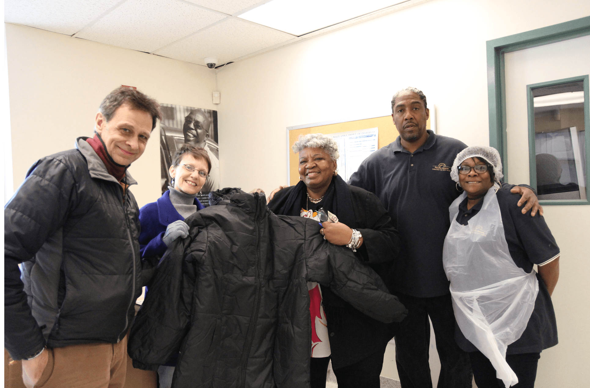 Left to right: Don Adams and Mitzi Adams of Peace Community Chapel, with Pacific House residential services manager Velma Clark, and client service advocates. Frank Knight and Theresa Gainer. Dec 20, 2017 Photo: Leslie Yager