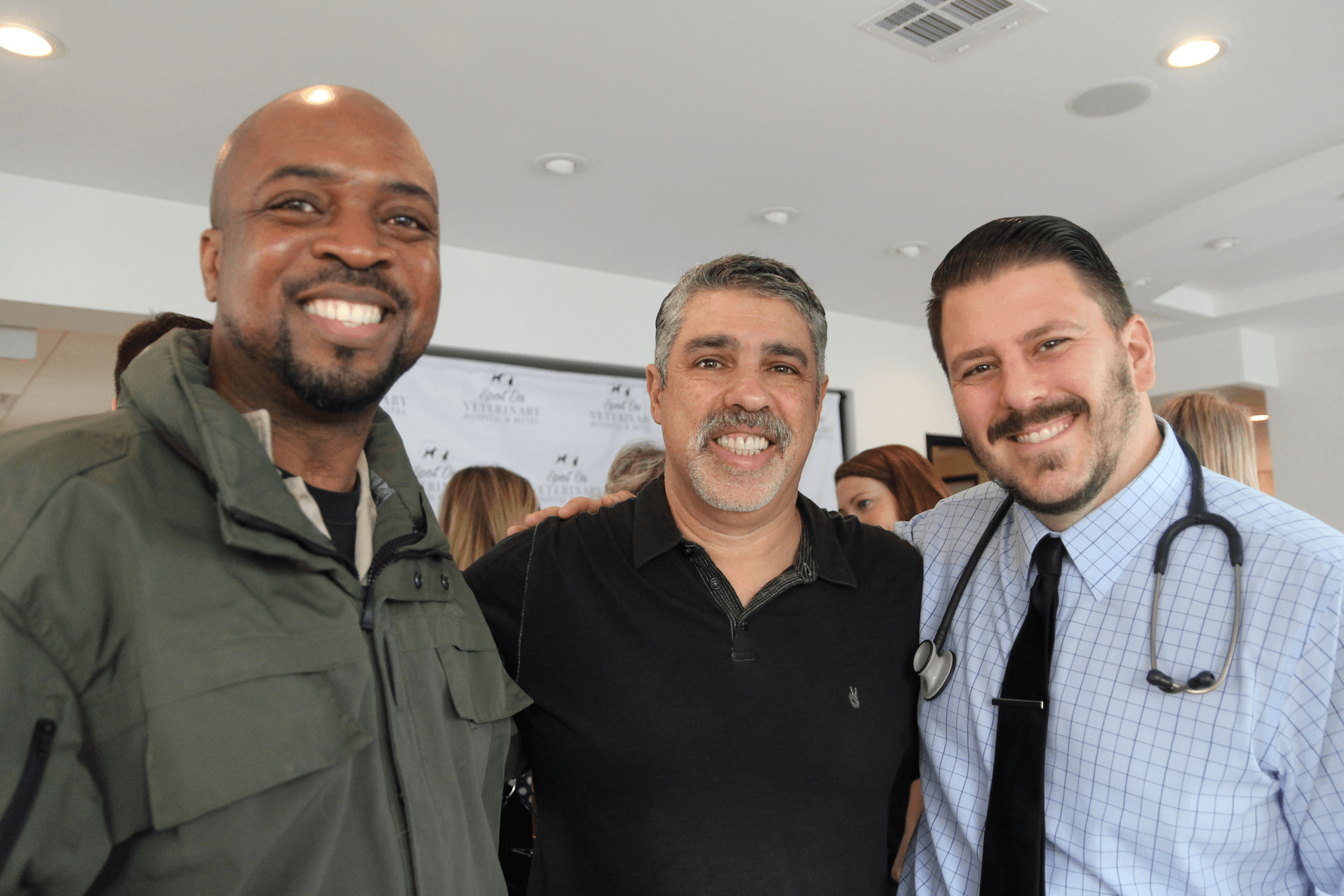 Stamford Animal Control Officer Tilford Cobb with Greenwich Parks & Rec Vice Chair Gary Dell'Abate,and Spot On owner and founder. Dr. Philip Putter at the ribbon cutting ceremony, Dec 19, 2017 Photo: Leslie Yager