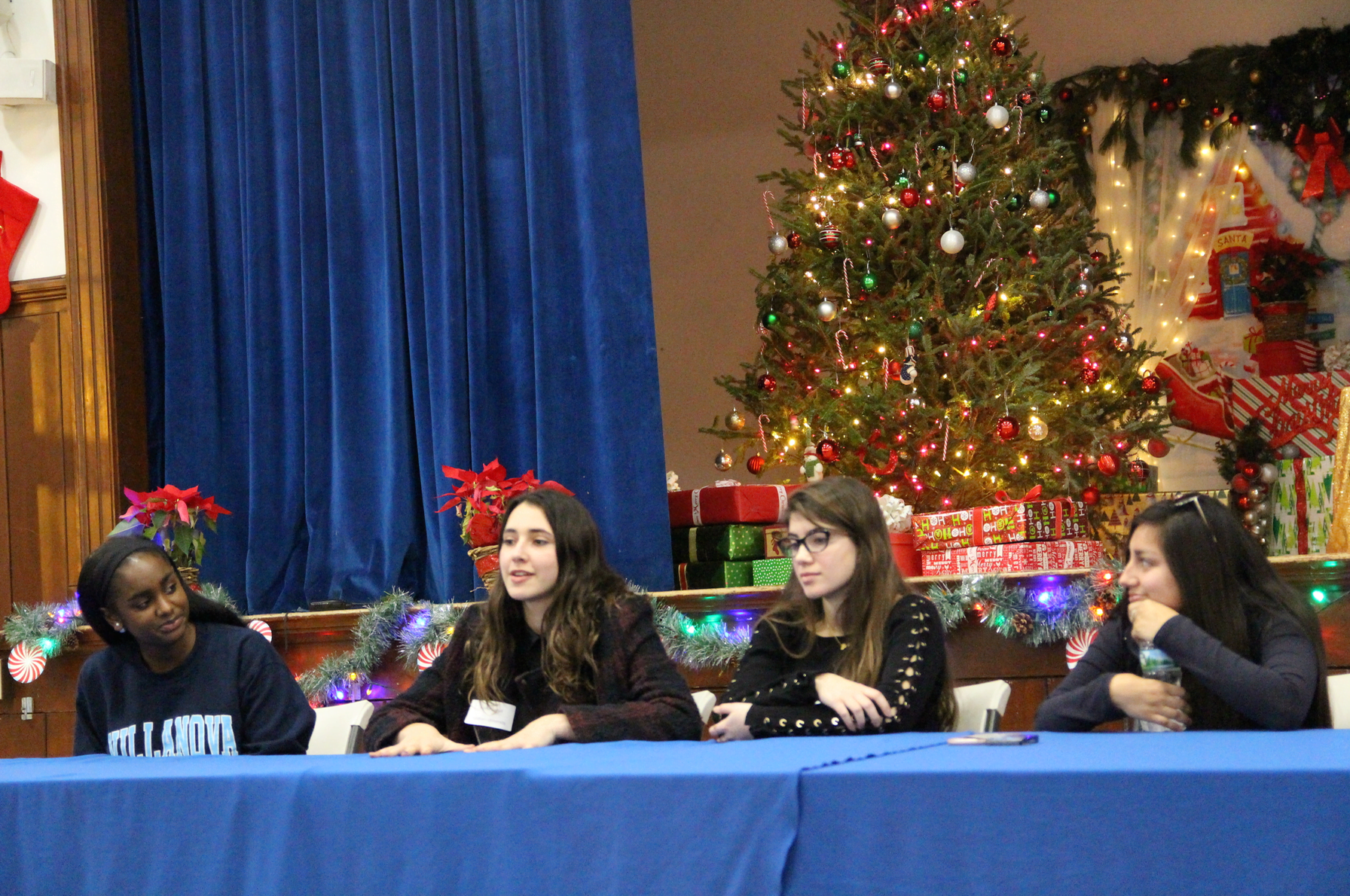 Dana Wadsworth, Sophia Daoud, Gaia Fakhoury and Gabriella Bravo fielded questions from Keystone Club members at the Boys & Girls Club of Greenwich, Dec 19, 2017 Photo: Leslie Yager