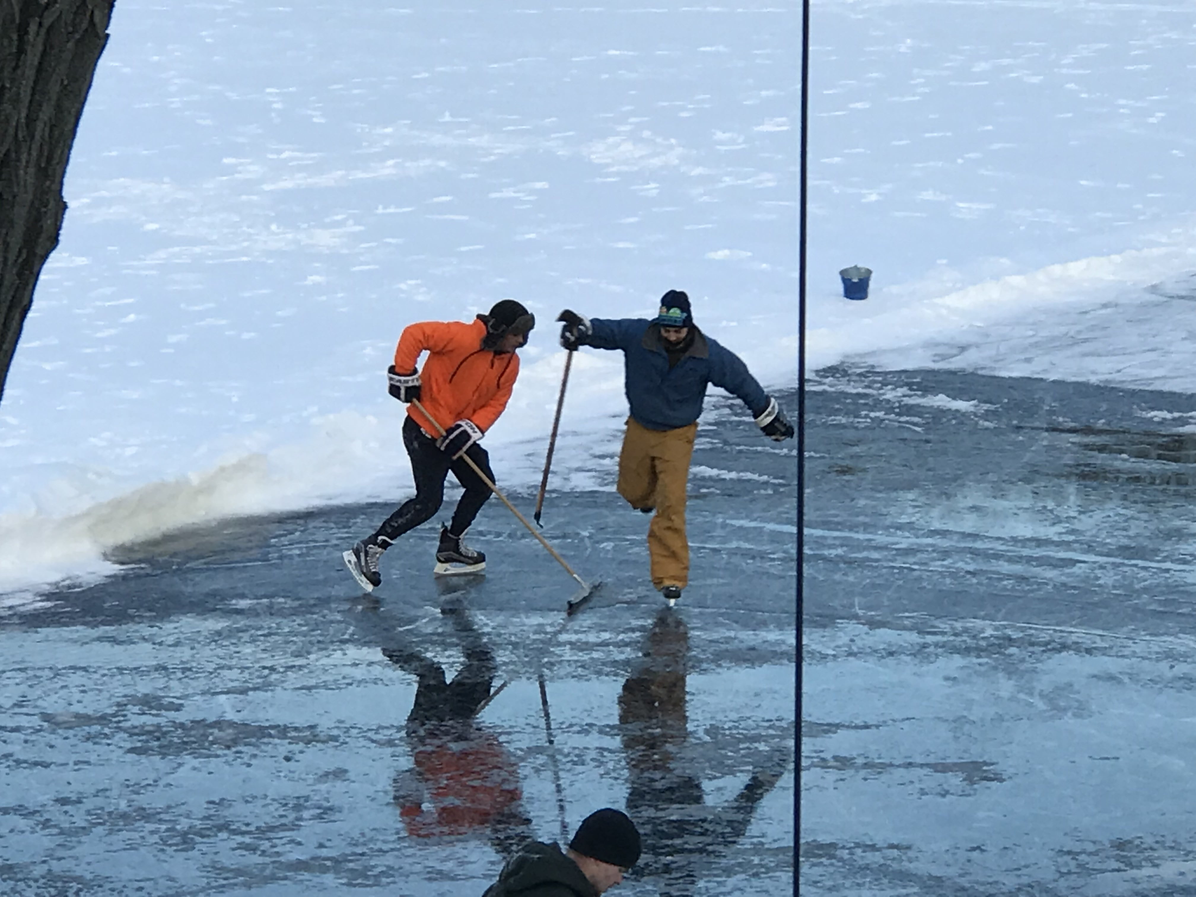 Around 3pm on Sunday, someone had the ingenious idea of cutting a small hole in the ice and using a generator to pump water through a hose onto the ice. Who needs a Zamboni? contributed photo
