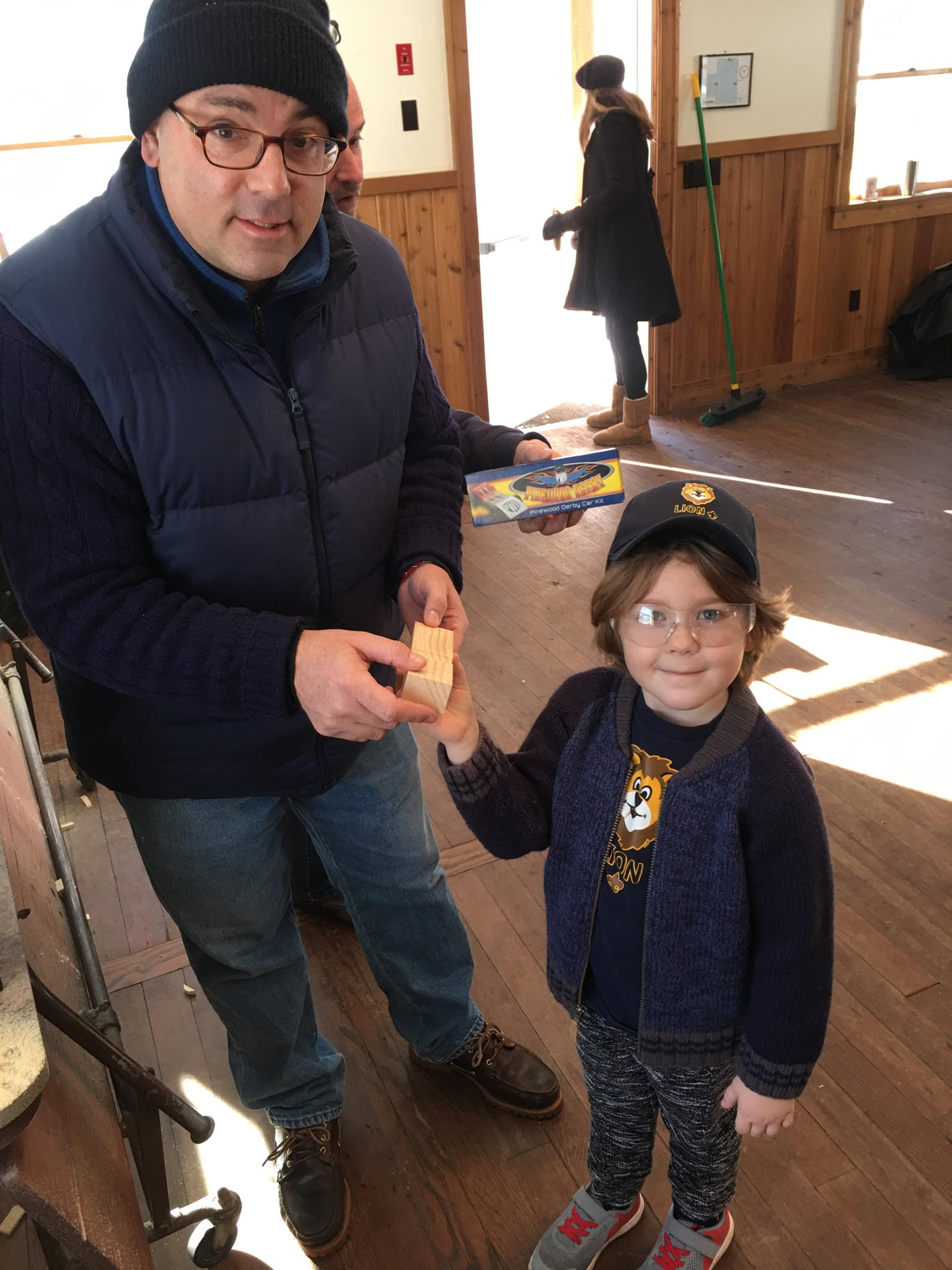 Bob Strassel helping carve tiger cub during a recent Pinewood Derby workshop at Camp Seton. contributed photo
