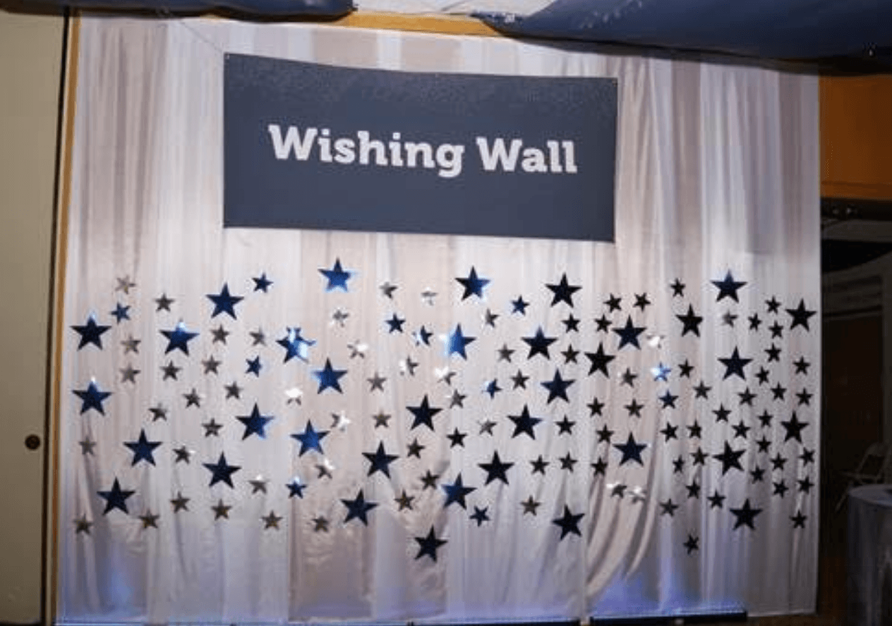 Temple Sholom added a new fundraising element this year, a Wishing Wall full of stars, which featured the names of programs, events and items that could be sponsored. Photo credit: Marilyn Roos Photography