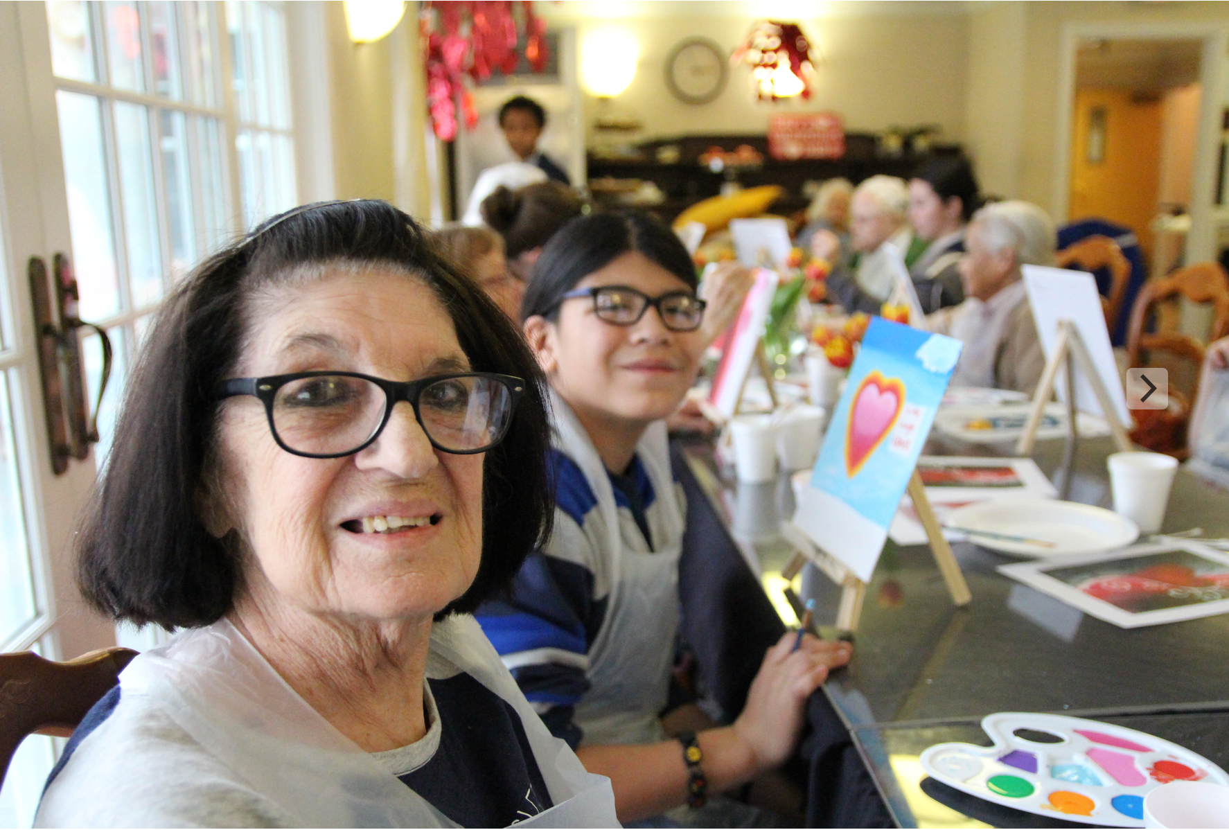 Torch Club members from the Boys & Girls Club of Greenwich paired off with seniors at Parsonage Cottage for a Valentine's Day themed painting project. Feb 17, 2018 Photo: Leslie Yager