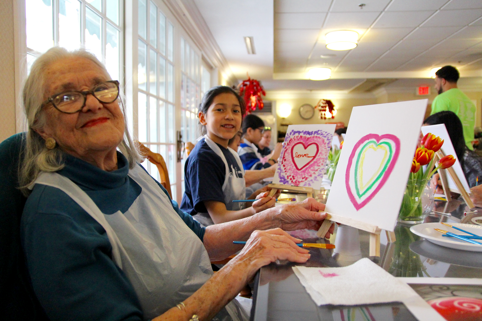 Katherine and Maryssa painted hearts together on Saturday at Parsonage Cottage. Feb 17, 2018 Photo: Leslie Yager