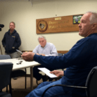 Parks and Trees Division's Darrin Wigglesworth (foreground) and Tree Warden Bruce Spaman (center) at hearing regarding two Oak trees in Bible Street Park. Feb 22, 2018 Photo: Leslie Yager