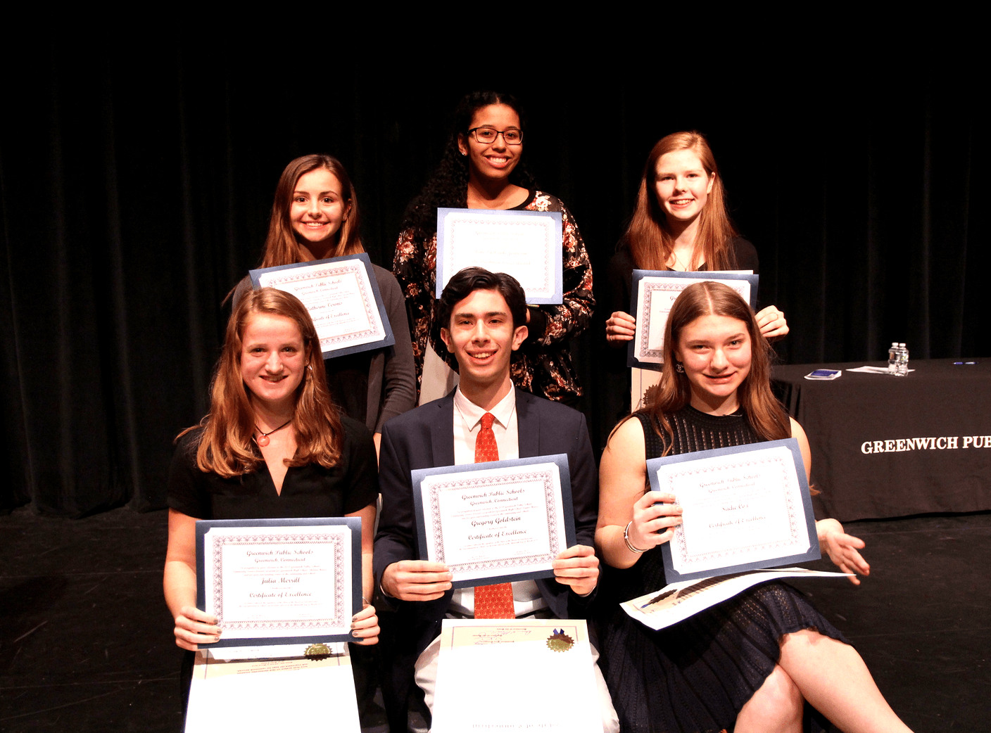 Greenwich High School community service award winners, clockwise from rear: Catherine Veronis from Folsom House, René Jameson (Fleishman Service Award), Flora Dievenich Braes from Bella House, Sadie Cox from Clark House, Greg Goldstein from Cantor House and Julia Merrill from Sheldon House. March 13, 2018 Photo: Leslie Yager