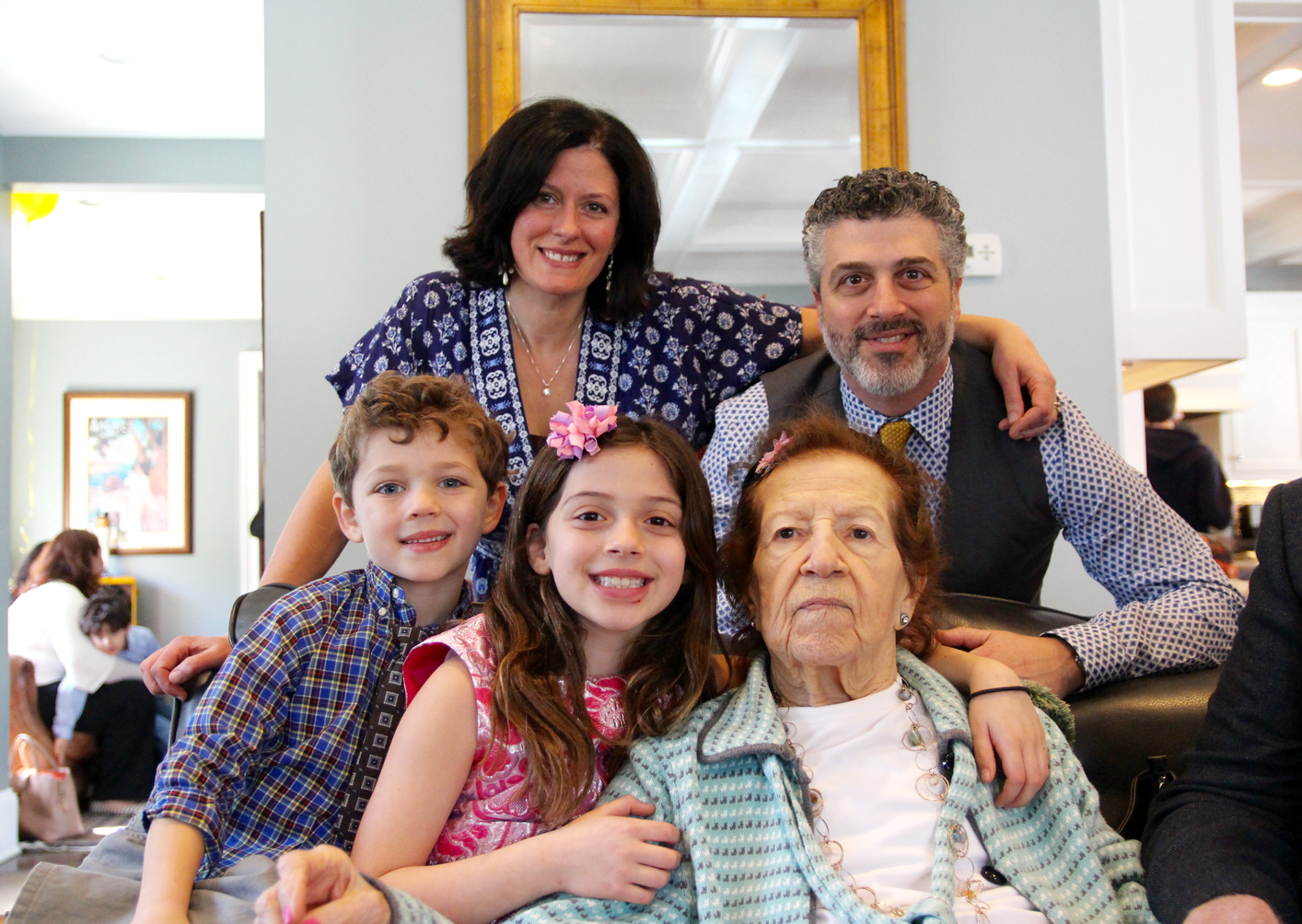 Jessica, Marc Gus and Piper Reynolds, with Marion Pastore at her 100th birthday party, March 11, 2018 Photo: Leslie Yager