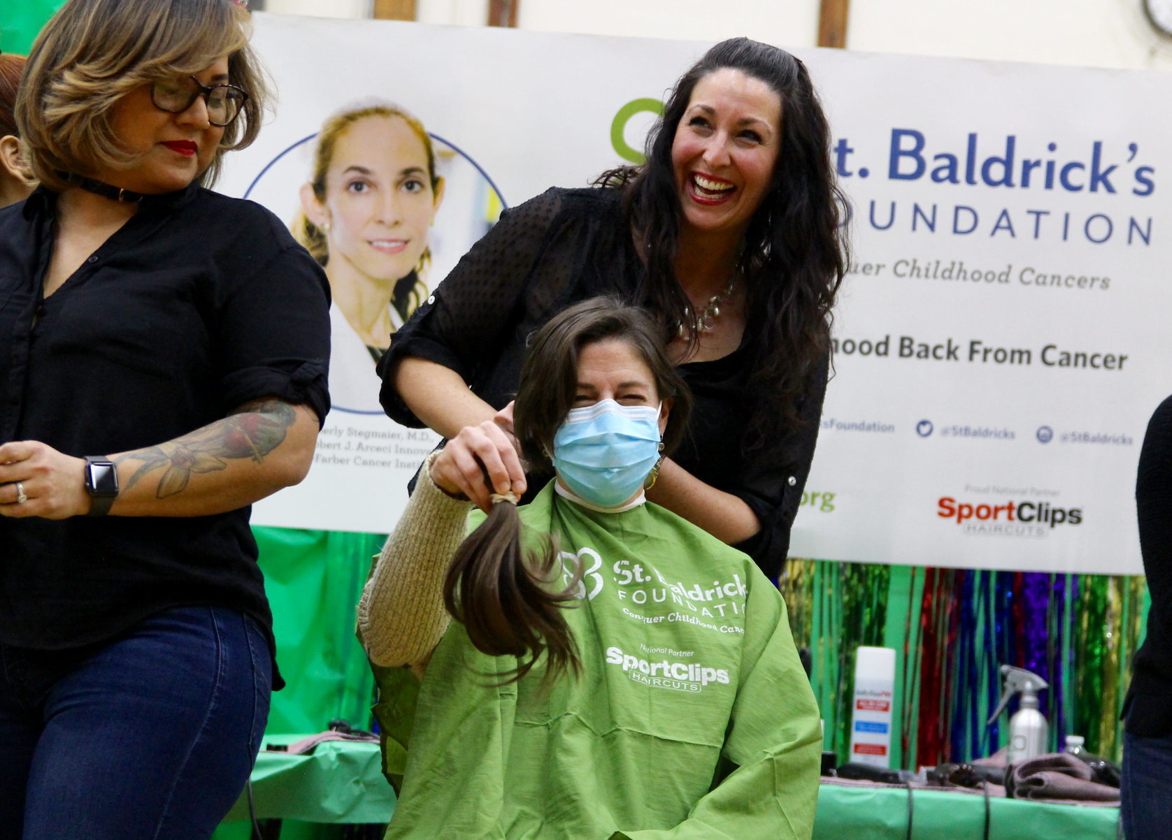 Heather Brown with her pony tail just before being shaved at the St. Baldrick's Foundation fundraiser at Western Middle School. March 15, 2018 Photo: Leslie Yager