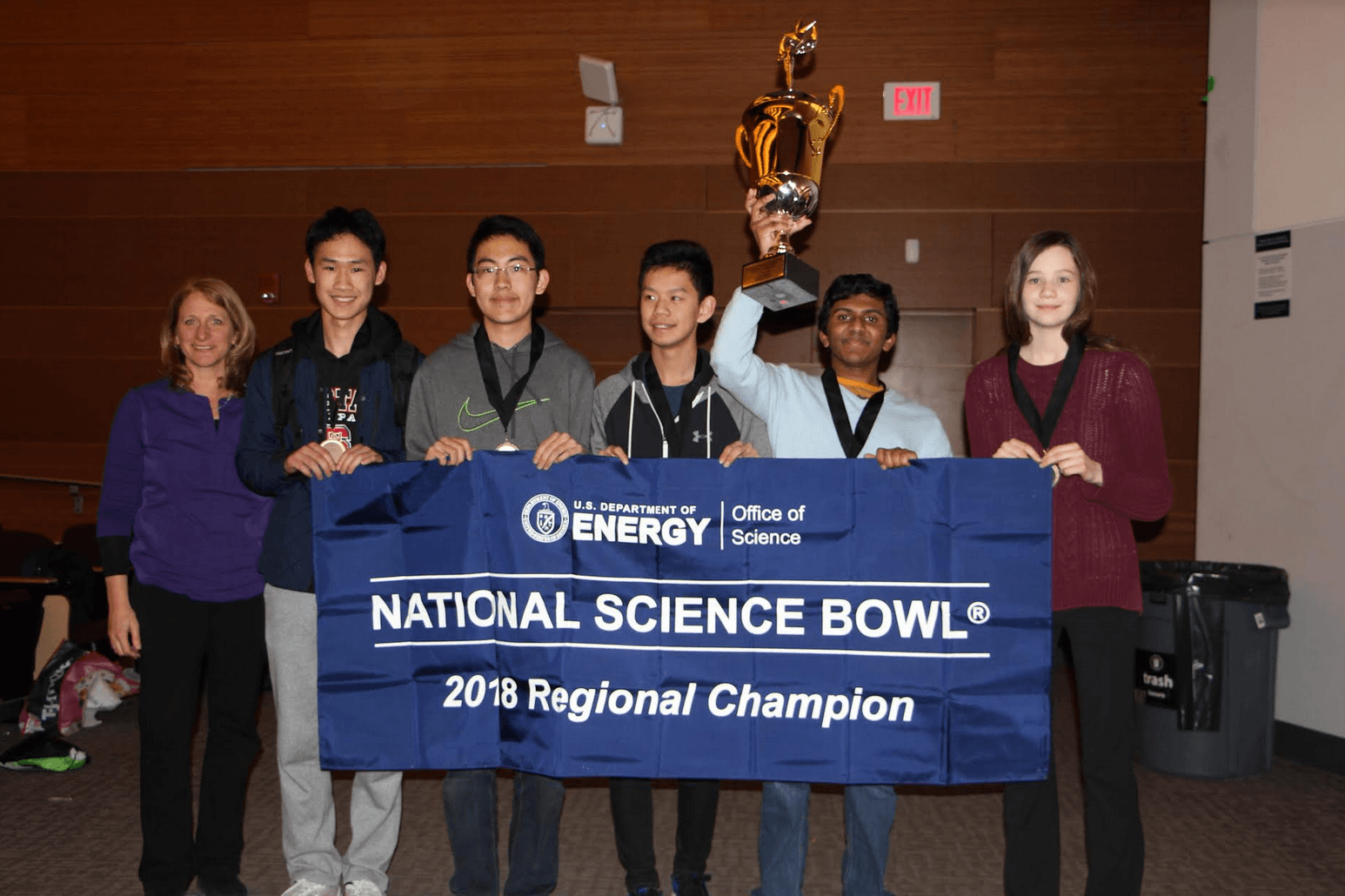 Pictured from left to right: Team Adviser/Coach Maria Buono, Nicholas Liu, Henry Shi, Derrick Xiong, Rahul Subramaniam, and Phoebe Hartch