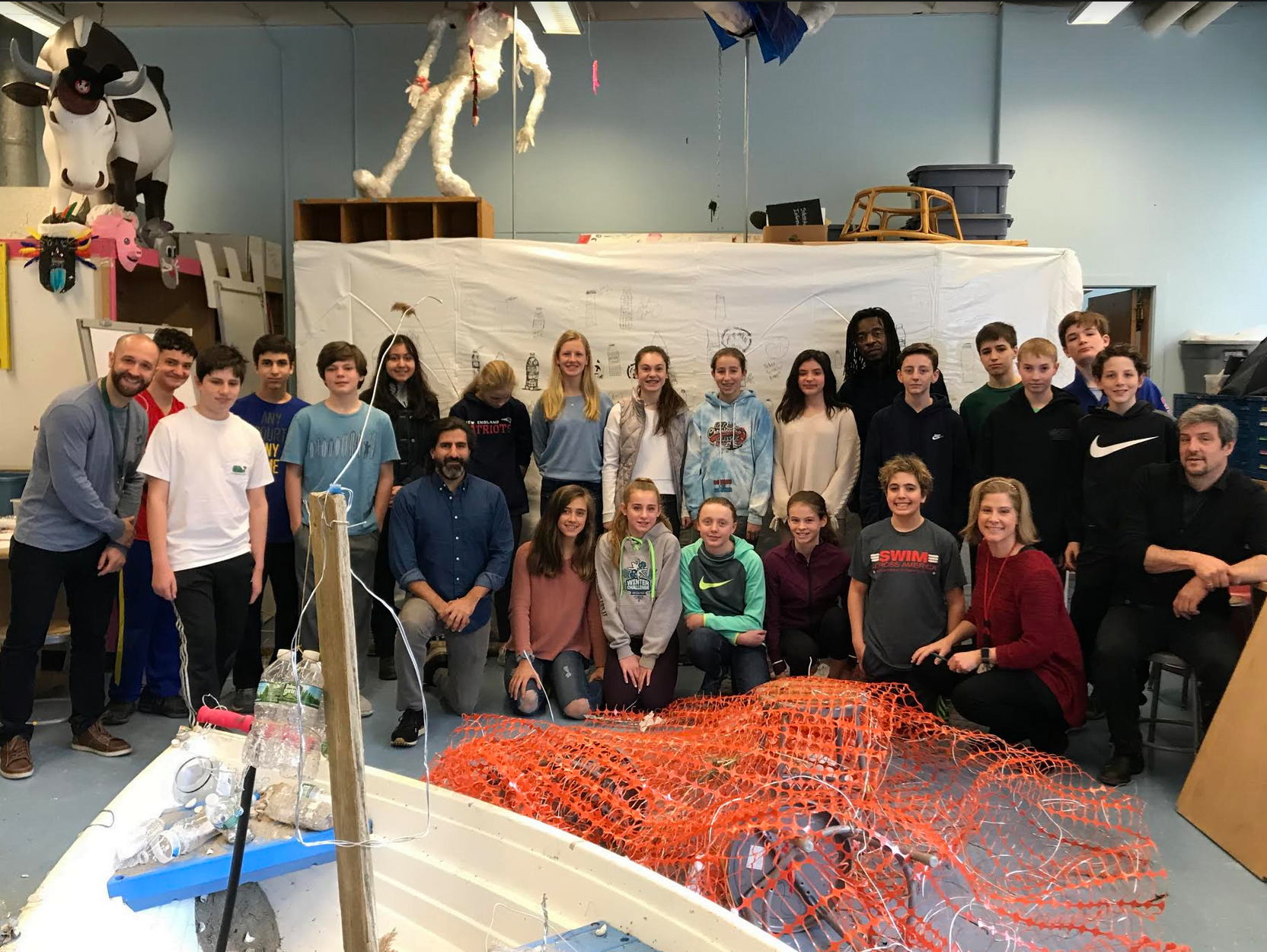 EMS Students Create "Message in a Bottle" Art Installation with Reclaimed Materials 
