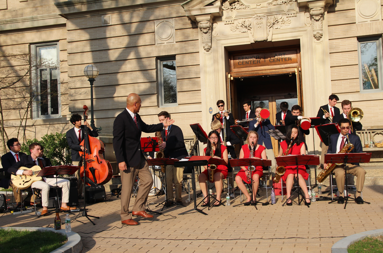 Band director John Yoon with the band outside the Senior Center during Art to the Avenue's opening night. May 3, 2018 Photo: Leslie Yager