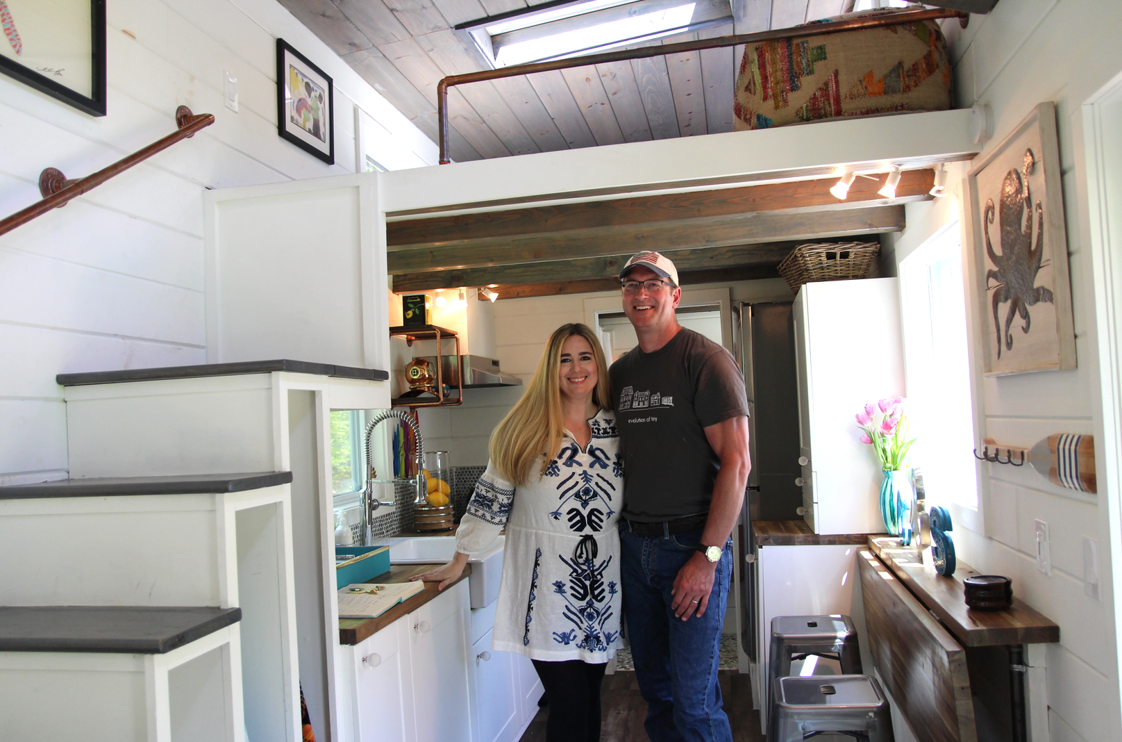 Ken and Tori Pond inside their tiny house on wheels in Greenwich. May 9, 2018