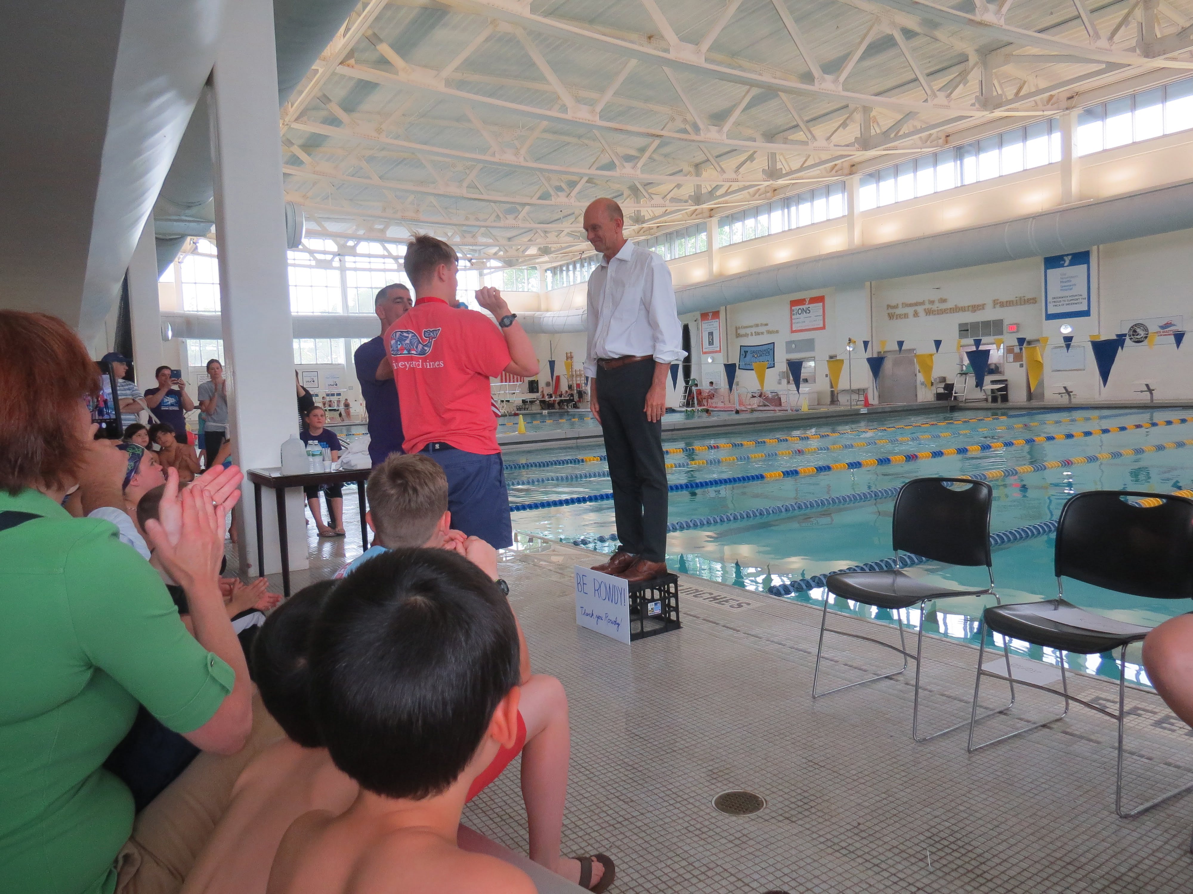 Special Olympian Kieran McQuire presents Gaines with his honorary medal. Photo: Alex Willcox.