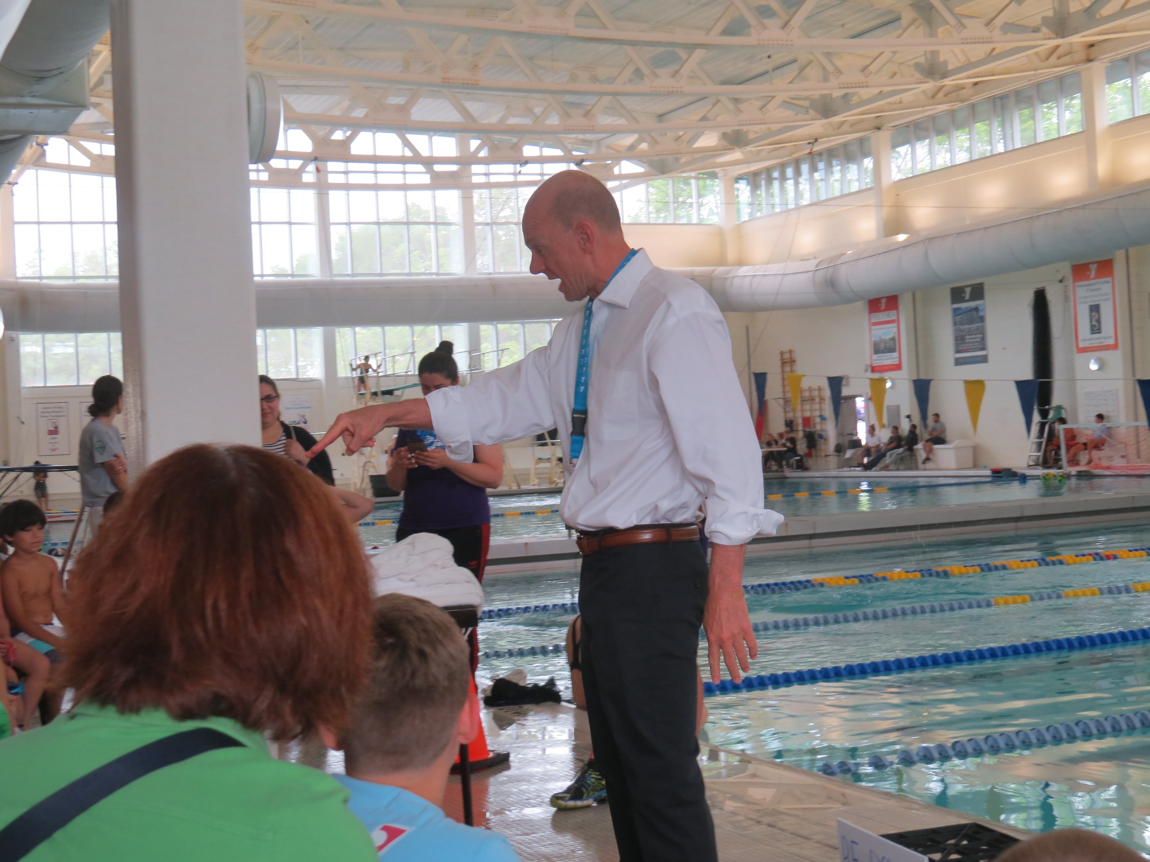 Gaines challenging the children to a race against him. Photo: Alex Willcox.