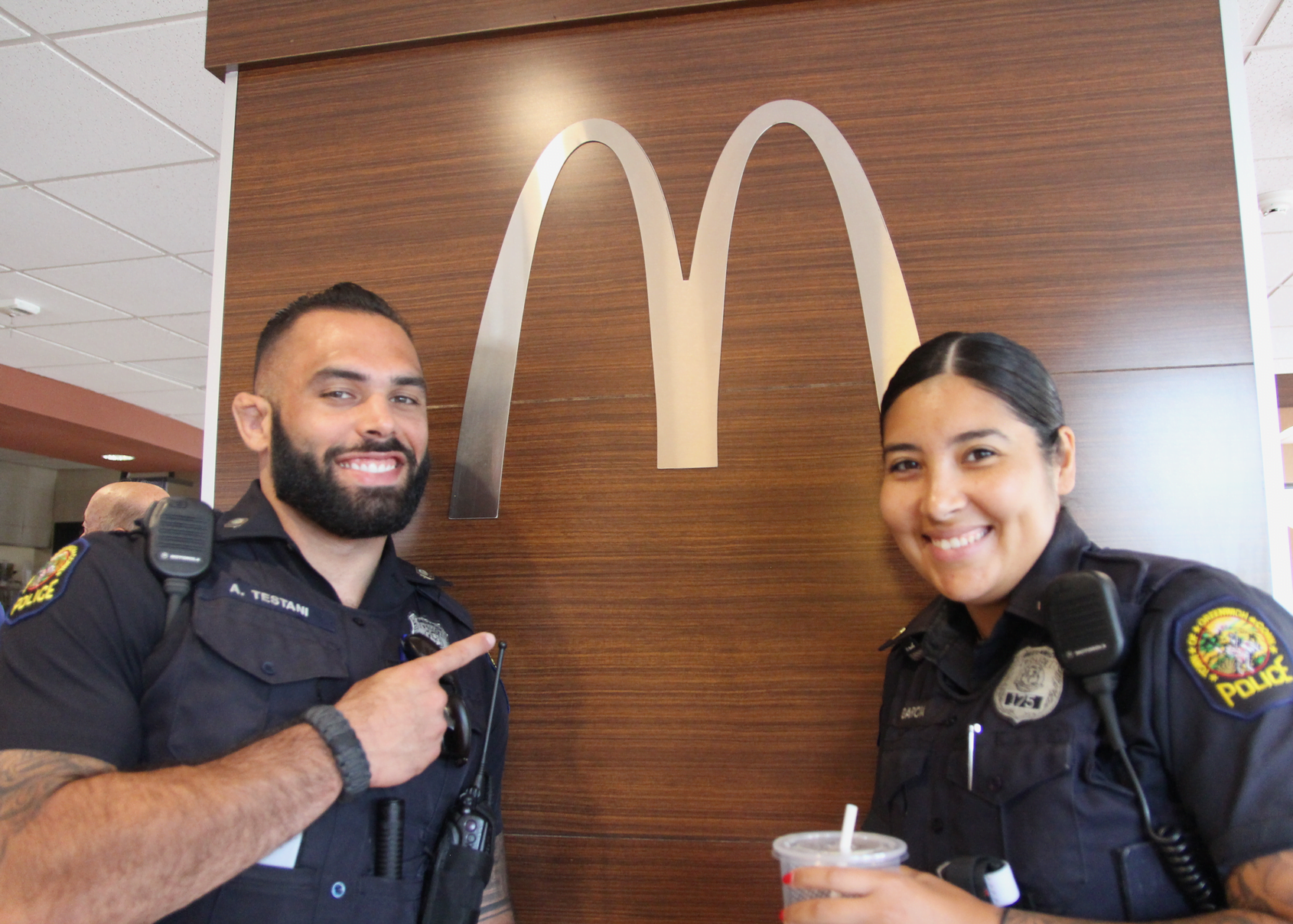 Officer Alex Testani and Officer Ericka Garcia at McDonald's on West Putnam Avenue for the Coffee with a Cop event. July 11, 2018 Photo: Leslie Yager