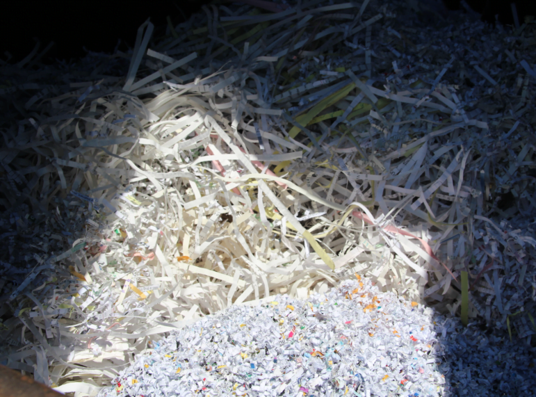 The temporary shredded paper trash bin. Photo: Leslie Yager.