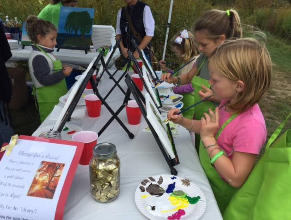 Children easel paint with Future Picassos at the 2017 Indian Summer Children’s Festival at Greenwich Audubon.