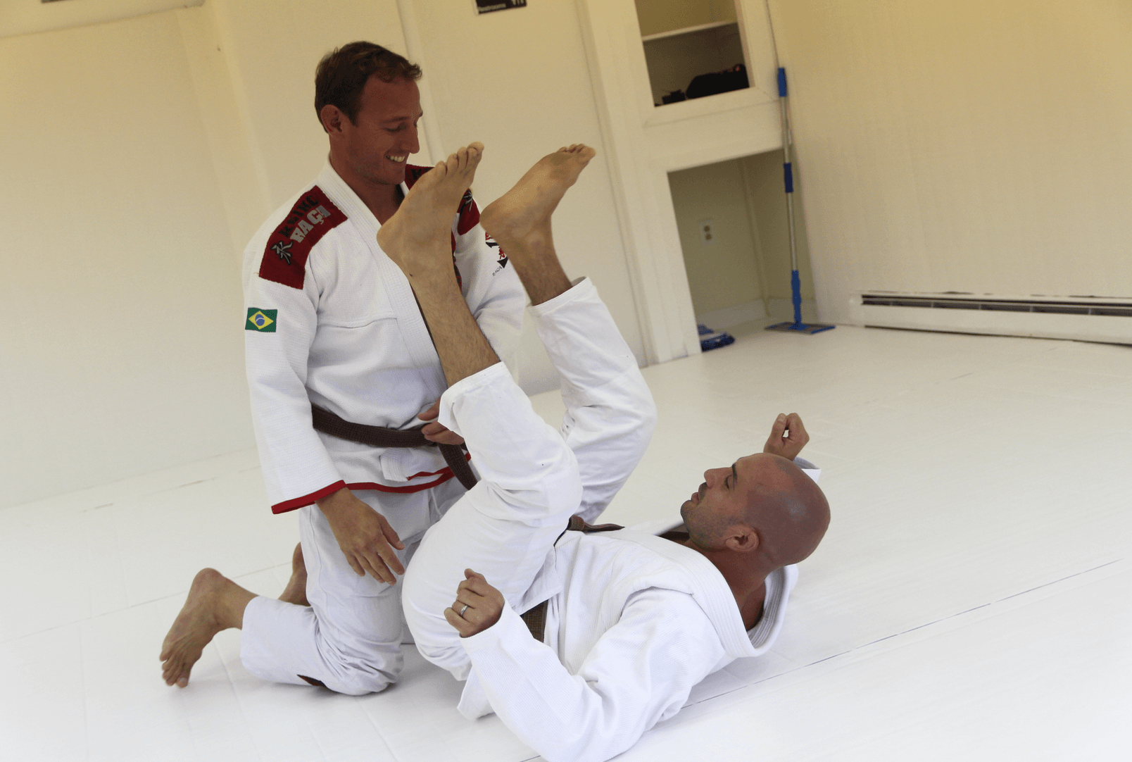 Joe Darula and Jeff Morris grappling on the mat at Greenwich Jiu-Jitsu Academy. Sept 18, 2018 Photo: Leslie Yager