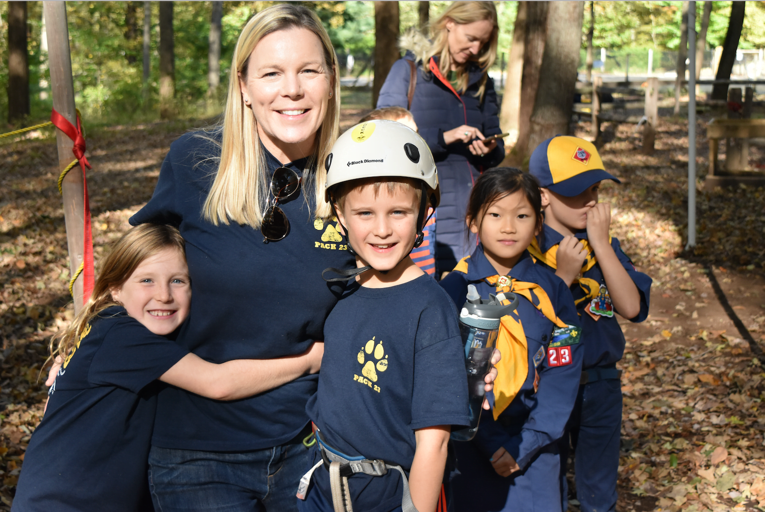 Pack 23 Cubmaster Cindy DiPreta with Cub Scouts Charlotte and Chris DiPreta at Greenwich Scouting's Fall Festival at Seton Scout Reservation.