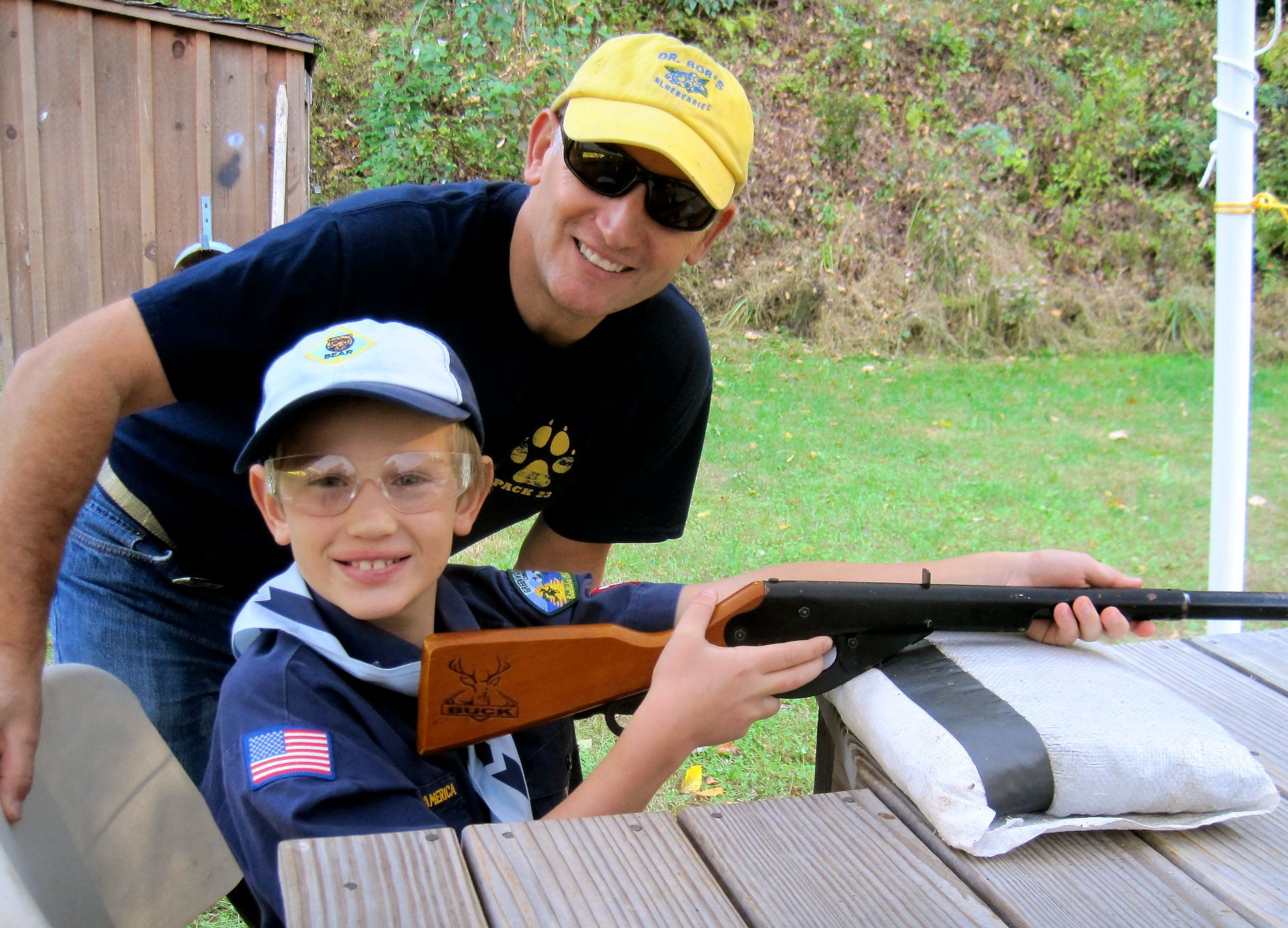 Richard Kosinski with son Jack at the BB range at Greenwich Scouting's Fall Festival at Seton Scout Reservation.