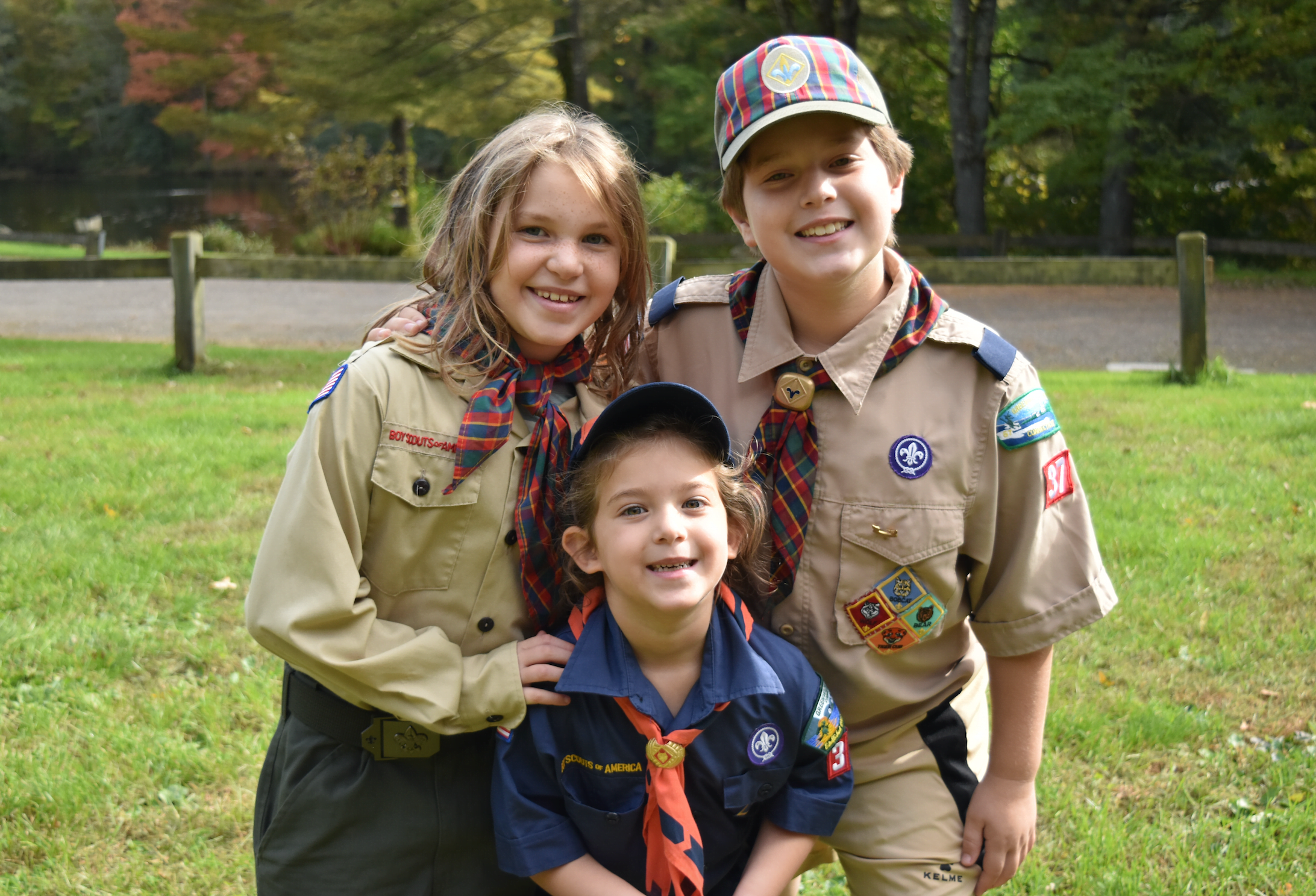 Cub Scouts Mattie and Jamie Leader with their cousin Caroline Zisson at Greenwich Scouting's Fall Festival at Seton Scout Reservation.