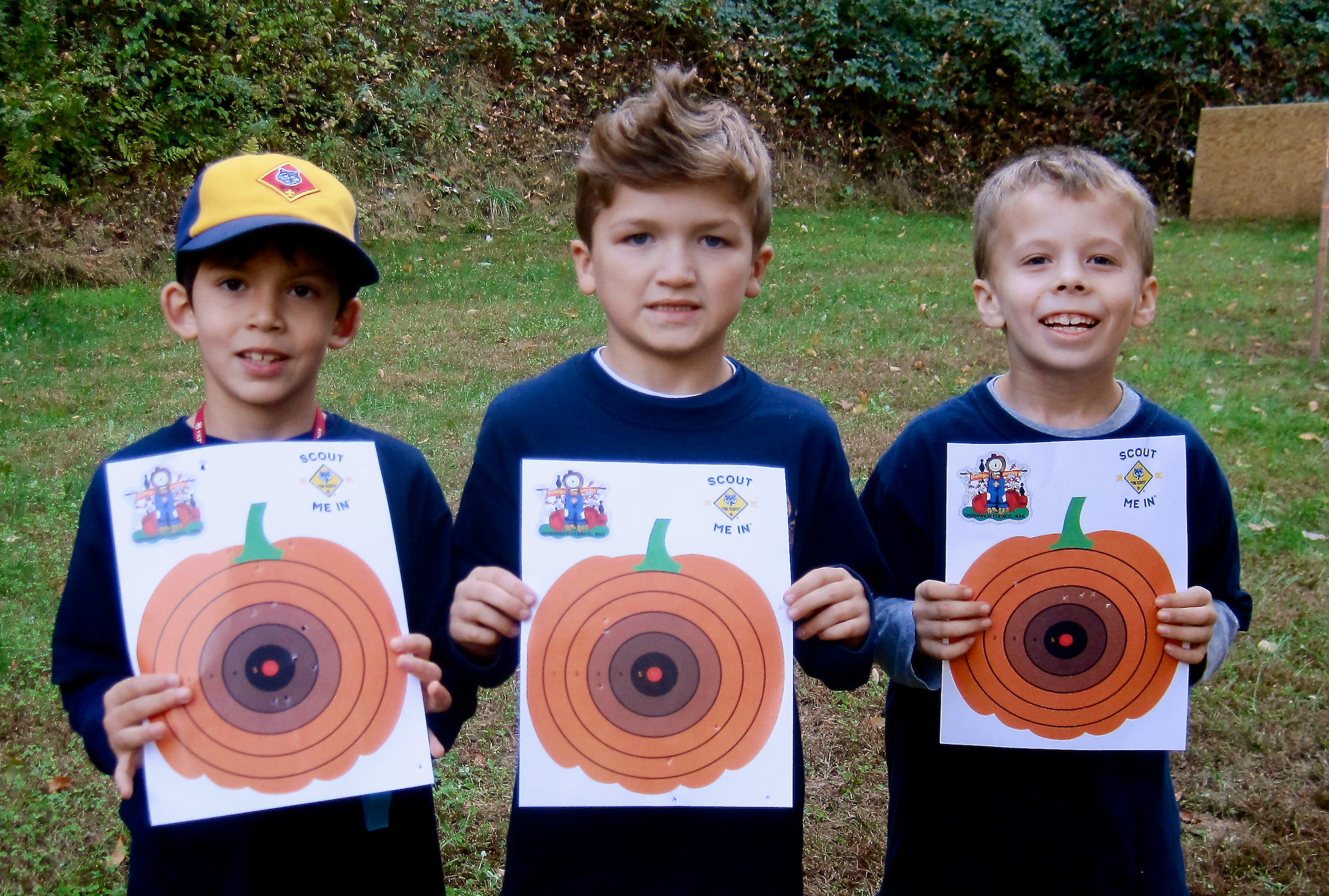 Cub Scout Blake Rodriguez, Patrick Cosby & George Mullins hold their BB targets proudly at Greenwich Scouting's Fall Festival at Seton Scout Reservation.