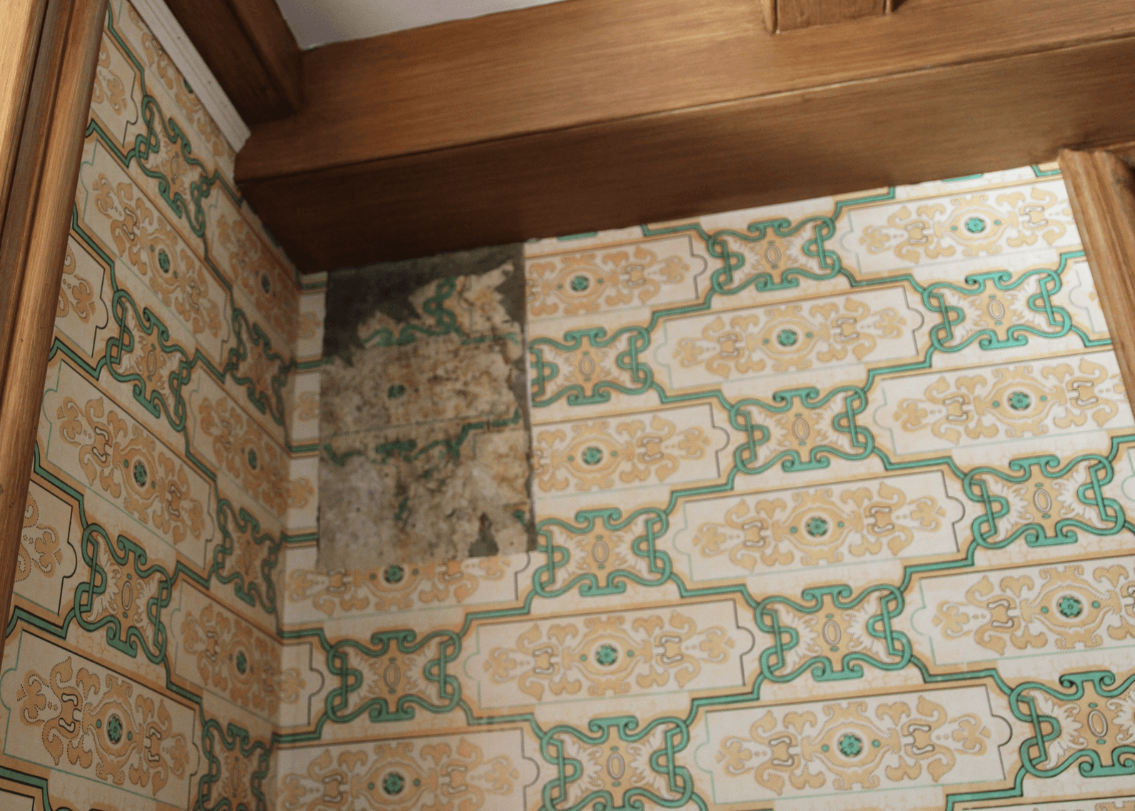 A small patch of the original wallpaper is visible in a corner of the museum café. Photo: Leslie Yager